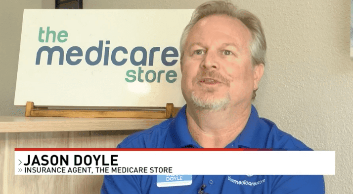 Jason Doyle, insurance agent with The Medicare Store, interviewed on KRNV News 4 in front of The Medicare Store sign